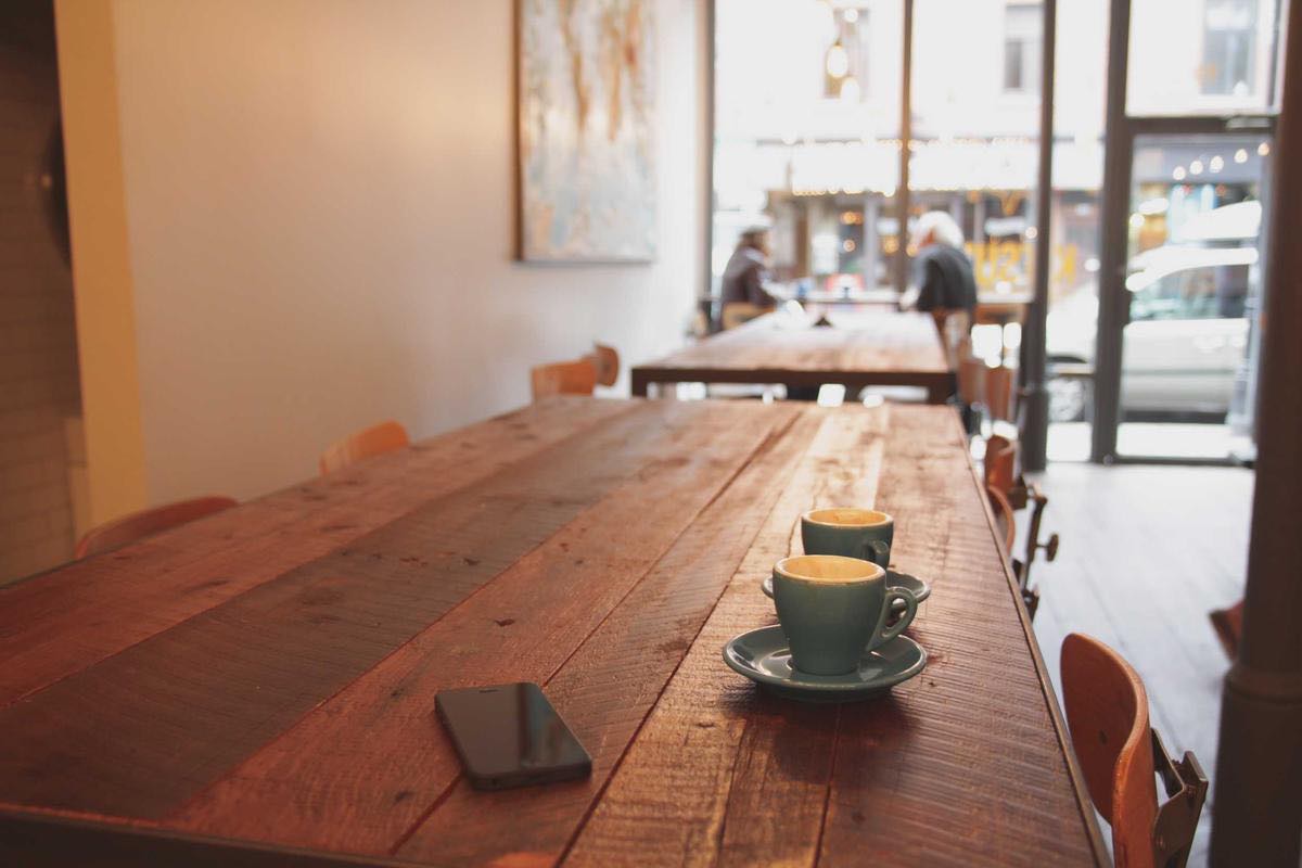 Warm wood café interior with morning light